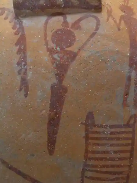 Heart shape symbol formed by a female for a dance ritual